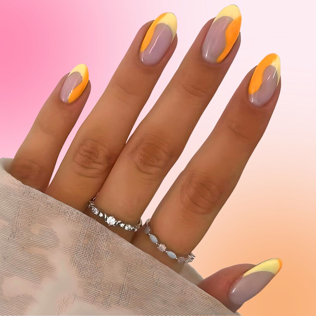 yellow french tip short round press on nail with ombre semi transparent base meshing into orange.